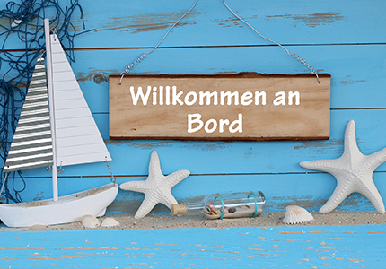 Flusskreuzfahrten_Willkommen_an_Bord_Schild_Pressmind