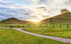 Panorama of Royal Mounds on sunset in Gamla Uppsala, Uppland, Sweden