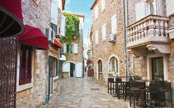 view narrow street in old district of Budva, Montenegro